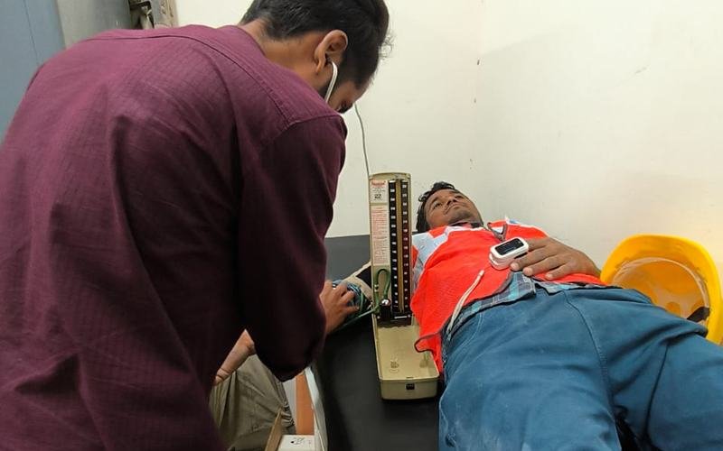A patient being examined at a camp
