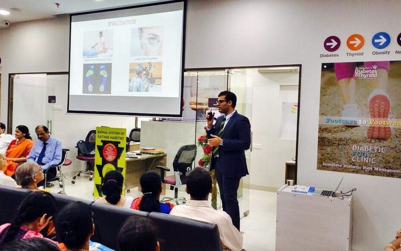 A doctor presenting at a Synergy Health Foundation CME session